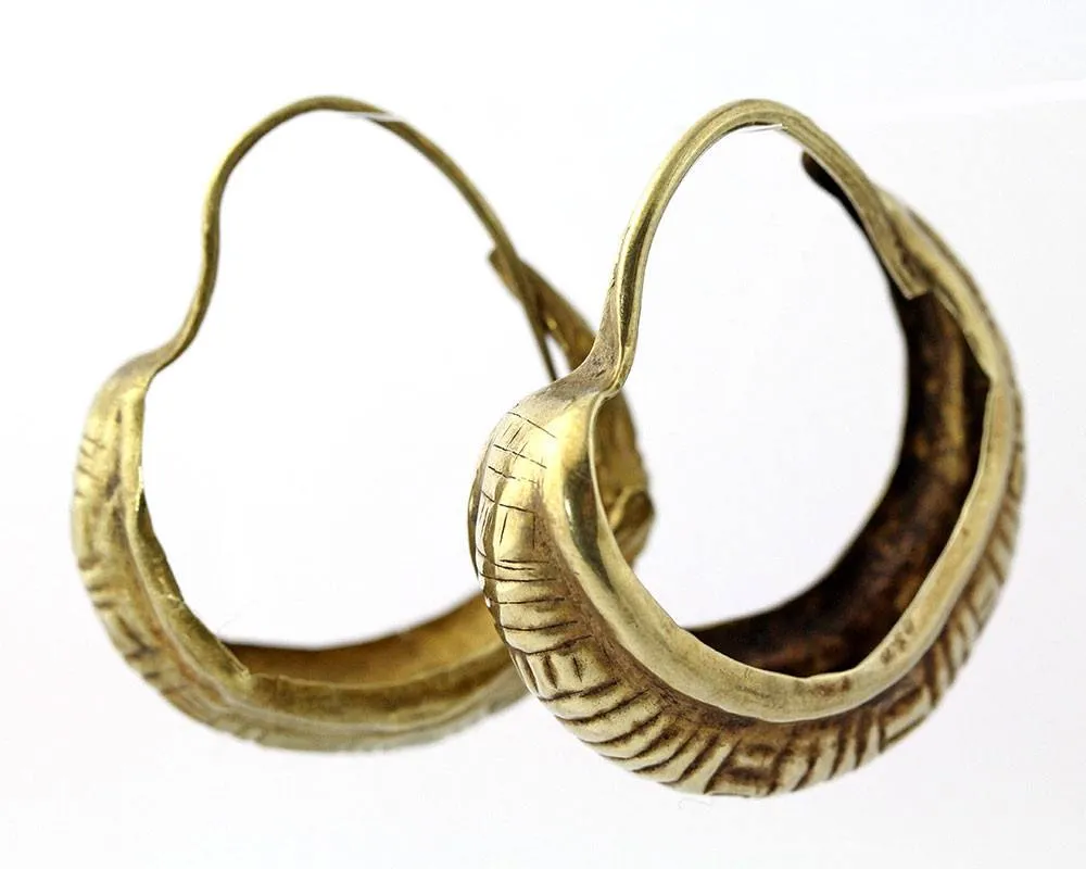 A pair of Mesopotamian Gold Lunate Earrings, Early Dynastic Period, ca. 2500 - 2400 BCE