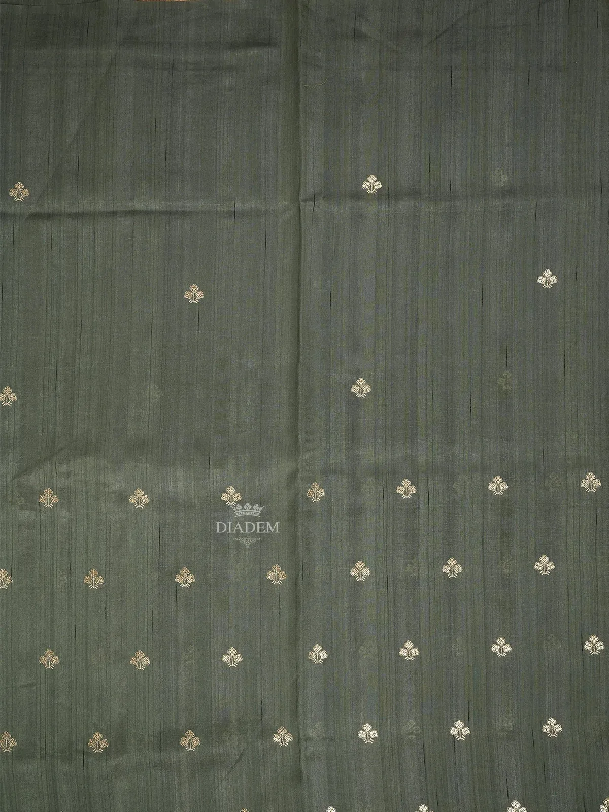 Dark green Tussar Silk Saree with Floral Designs on the Body and with Designed Border