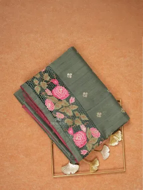 Dark green Tussar Silk Saree with Floral Designs on the Body and with Designed Border