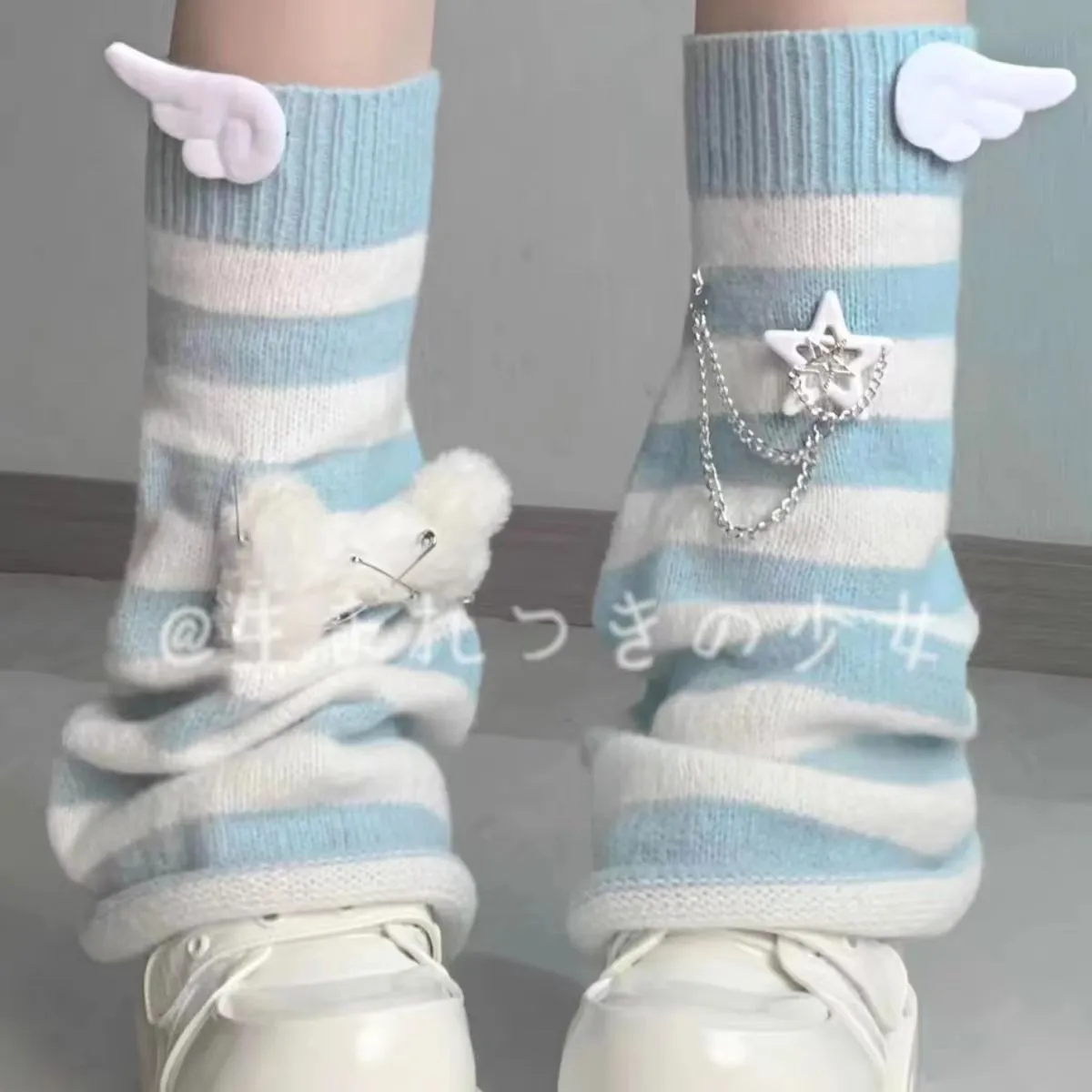 Subculture aqua striped flared leg warmers