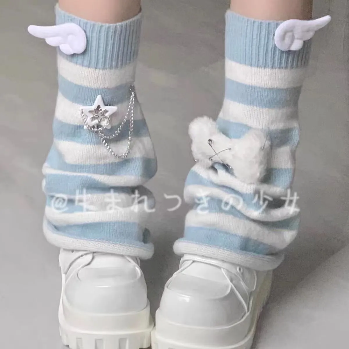 Subculture aqua striped flared leg warmers